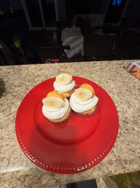 Frosted cupcakes on a red plate